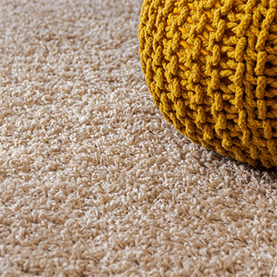 Close up view of tan carpeting in Calabasas, CA after work done by carpet installers.